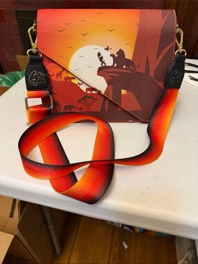 The lion king 30year anniversary pride rock crossbody bag NEW